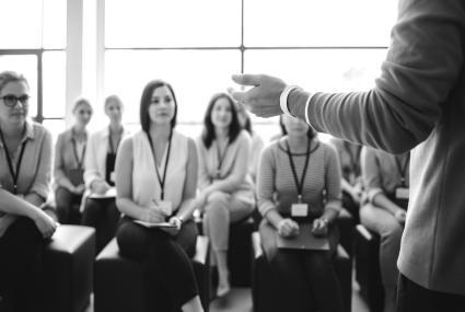 Audience listening and engaging with a speaker